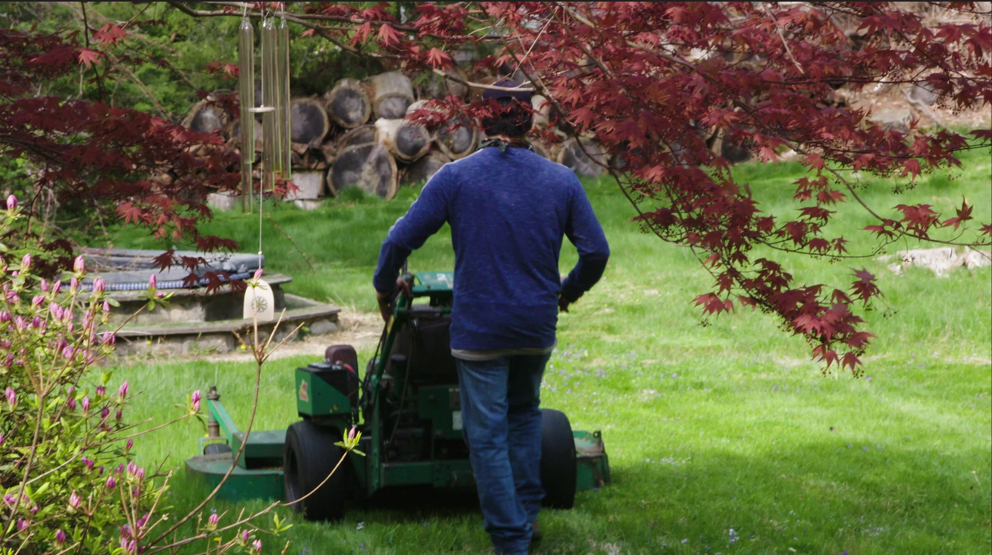 man mowing